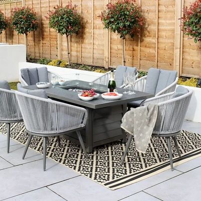 Metalen AJUNION 6 zitplaatsen Buitenmeubelen met vuurput Tafel en touw weef fauteuil