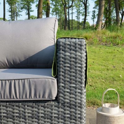 Moderne rottangardenset met sectioneel eettafel en verhoogtafel