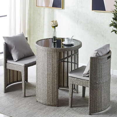 Rattan gehard glas ronde eettafel en stoel set voor koffie winkel modern ontwerp