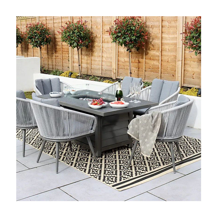 Metalen AJUNION 6 zitplaatsen Buitenmeubelen met vuurput Tafel en touw weef fauteuil