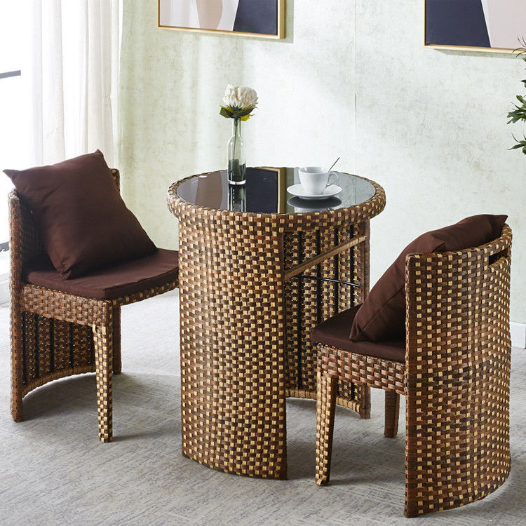 Rattan gehard glas ronde eettafel en stoel set voor koffie winkel modern ontwerp